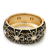 Black Enamel 'Daisy' Hinged Bangle Bracelet In Gold Plating - 19cm Length