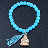 Light Blue Glass Bead Stretch Bracelet with Gold Plated Buddha Charm & Silk Tassel - 6mm - Up to 20cm Length