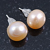 9mm Cream Off-Round Cultured Freshwater Pearl Stud Earrings In Silver Tone