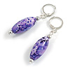 Candy Style Oval Glass Bead Drop Earrings In Silver Tone in Purple Shades - 50mm L