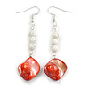 Long White Ceramic/  Red Shell Bead Linear Earrings in Silver Tone - 70mm L