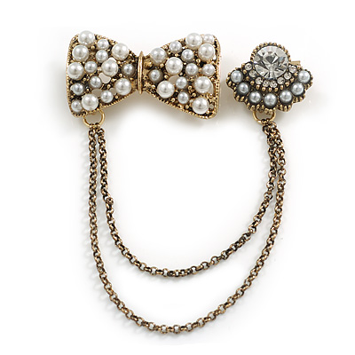 Vintage Inspired Bow and Crystal Bead Chain Brooch In Aged Gold Tone Finish - main view
