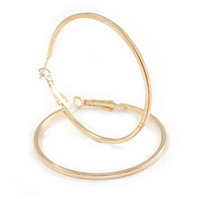 50mm Slim Ribbed Polished Hoop Earrings In Gold Tone