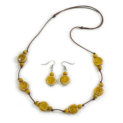 Dusty Yellow Ceramic Coin/ Round Bead Brown Cord Necklace and Drop Earrings Set/48cm L/Slight Variation In Colour/Natural Irregularities - main view