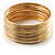 Textured And Polished Metal Bangles- Set of 14 (Gold Tone) - view 11