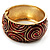 Wide Swirl Pattern Red Enamel Hinged Bangle Bracelet (Gold Tone)