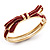 Stylish Dark Red Enamel Bow Hinged Bangle Bracelet In Gold Plated Metal - 18cm Length - view 1