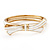 Stylish Snow White Enamel Bow Hinged Bangle Bracelet In Gold Plated Metal - 18cm Length - view 6