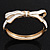 Stylish Snow White Enamel Bow Hinged Bangle Bracelet In Gold Plated Metal - 18cm Length - view 2