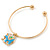 Gold Tone Slip-On Cuff Bracelet With A Light Blue Enamel Elephant Charm - 19cm L - view 4