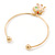 Gold Tone Slip-On Cuff Bracelet With A White Enamel Elephant Charm - 19cm L - view 6