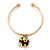 Gold Tone Slip-On Cuff Bracelet With A Black Enamel Elephant Charm - 19cm L