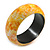 Round Wooden Bangle Bracelet with Abstract Motif Painted in Yellow/Orange/White/Red Colours - Medium Size