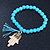 Light Blue Glass Bead Stretch Bracelet with Gold Plated Hamza Hand Charm & Silk Tassel - 6mm - Up to 20cm Length - view 3