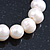 12mm Off White Freshwater Pearl Flex Bracelet With A Mother Of Pearl Central Flower - 17cm L - view 10