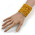 Wide Wood and Glass Bead Coil Flex Bracelet In Yellow - Adjustable - view 2