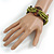 Multistrand Dusty Lime Green Glass Bead with Wooden Rings Flex Bracelet - Medium - view 2