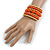 Wide Coiled Ceramic, Acrylic, Wood Bead Bracelet (Orange, Natural) - Adjustable - view 2