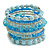 Wide Coiled Ceramic, Glass Bead Bracelet (Light Blue, Transparent) - Adjustable - view 1