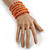 Wide Coiled Ceramic, Glass Bead Bracelet (Orange, Transparent) - Adjustable - view 2