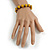 10mm Vintage Inspired Dusty Yellow Ceramic Bead Flex Bracelet - Size - S/M - view 3