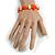 Orange/Coral Glass and Sea Shell Bead Flex Bracelet - M/L - view 2