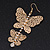 Long Lightweight Filigree Diamante 'Butterfly' Earrings In Gold Plated Metal - 8cm Length - view 3