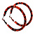 Medium Orange/ Black Snake Print Hoop Earrings In Silver Tone - 55mm Diameter