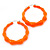 Medium Sized Bamboo Textured Doorknocker Hoop Earrings in Neon Orange - 5cm Diameter - view 2