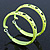 Medium Neon Yellow Enamel Cut Out Heart Hoop Earrings - 50mm Diameter - view 2