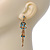 Vintage Inspired Light Blue Diamante Chandelier Earrings In Gold Plating - 65mm Length - view 3