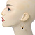 Medium Gold Plated Slim Hoop Earrings With Acorn Charm - 35mm Diameter - view 7