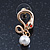 Sleek Simulated Pearl 'Snake With Red Eyes' Stud Earrings In Gold Plating - 30mm Length - view 6