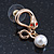 Sleek Simulated Pearl 'Snake With Red Eyes' Stud Earrings In Gold Plating - 30mm Length - view 7