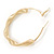 60mm Large Twisted Spring Hoop Earrings In Gold Tone Metal - view 5