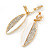 White Acrylic, Clear Crystal Leaf Clip On Earrings In Gold Plating - 45mm L - view 2