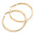 60mm Large Twisted, Textured Hoop Earrings In Gold Tone - view 2