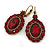 Vintage Inspired Oval Red Crystal Drop Earrings with Leverback Closure In Antique Gold Tone - 40mm L