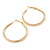 40mm Slick Polished Hoop Earrings In Gold Tone - view 5