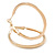 40mm Slick Polished Hoop Earrings In Gold Tone - view 2