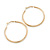 50mm Classic Slim Polished Hoop Earrings In Gold Tone - view 2