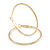 50mm Slim Ribbed Polished Hoop Earrings In Gold Tone