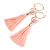 Long Peach Pink Cotton Ball and Tassel Hoop Earrings In Gold Tone Metal - 12.5cm L