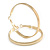 50mm Wide Polished Hoop Earrings In Gold Tone - view 4