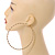 Oversized Twisted Hoop Earrings In Gold Tone Metal - 10cm Diameter - view 3