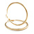 60mm Large Textured Thick Hoop Earrings In Gold Tone Metal - view 5
