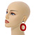Red Acrylic Oval Hoop/ Drop Earrings with Marble Effect In Gold Tone - 65mm L - view 2