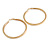 75mm Large Textured Hoop Earrings In Gold Tone - view 8