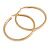 75mm Large Textured Hoop Earrings In Gold Tone - view 7
