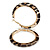 Trendy Brown/ Black Animal Print Acrylic Hoop Earrings In Gold Tone - 60mm Diameter - Large